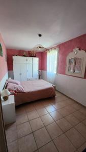 Postel nebo postele na pokoji v ubytování Villa Mimosa
