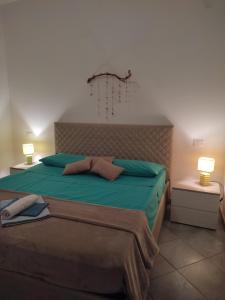 Postel nebo postele na pokoji v ubytování Casa Sara Boavista