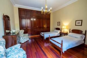 Postel nebo postele na pokoji v ubytování Espectacular Casa con Jardín "La Casa de Nena"