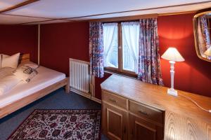 Postel nebo postele na pokoji v ubytování Alps Romantik
