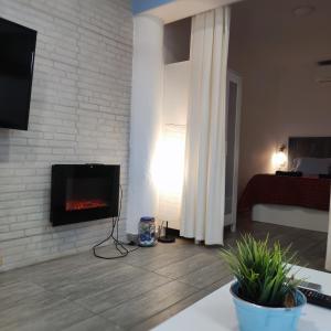 TV a/nebo společenská místnost v ubytování La Casa de Yiyi