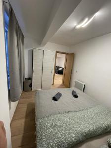 Postel nebo postele na pokoji v ubytování Apartman Mila