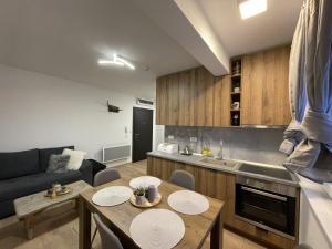 Kuchyň nebo kuchyňský kout v ubytování Apartman Mila