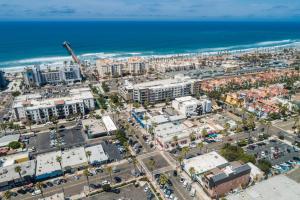 an aerial view of a city and the ocean at The Brick Boutique Hotel in Oceanside