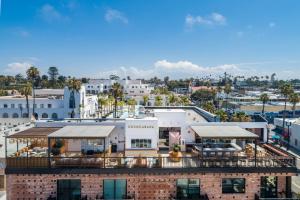 an aerial view of a city with a building at The Brick Boutique Hotel in Oceanside