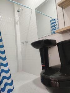 Koupelna v ubytování ROOM COLIBRÍ - La Casa de Eros