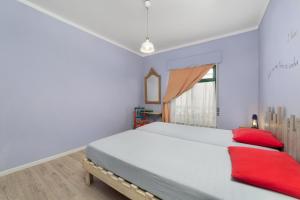 Postel nebo postele na pokoji v ubytování Al-Gharb Tavira Eco GuestHouse