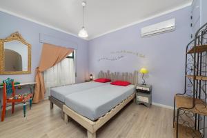 Postel nebo postele na pokoji v ubytování Al-Gharb Tavira Eco GuestHouse