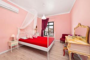 Postel nebo postele na pokoji v ubytování Al-Gharb Tavira Eco GuestHouse