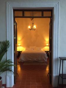 Katil atau katil-katil dalam bilik di Private Restored Hacienda With Its Own Cenote