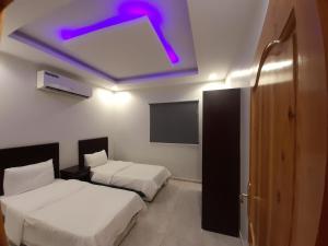 Katil atau katil-katil dalam bilik di Red Sea Resort (Families Only)