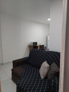 Postel nebo postele na pokoji v ubytování Itaguaí Flat - Centro