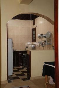A kitchen or kitchenette at Twin rooms close to most tourist areas