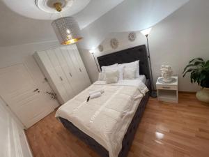Ένα ή περισσότερα κρεβάτια σε δωμάτιο στο Apartmani Cirovic Luxury