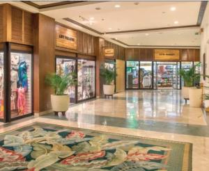 a lobby with a large rug on the floor at Blue Paradise Suite Free Parking in Honolulu