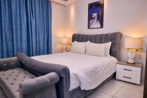 Postel nebo postele na pokoji v ubytování RESIDENCE NOUMSI