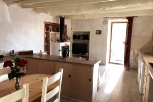 Kjøkken eller kjøkkenkrok på Maison de village vue montagne