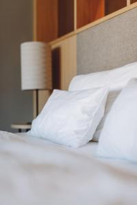Postel nebo postele na pokoji v ubytování Hotel Schwarzschmied