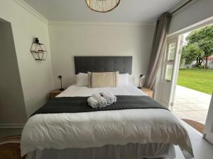 Katil atau katil-katil dalam bilik di VIilla Vredenrust Guesthouse