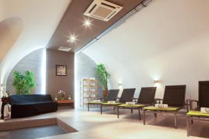 Uma área de estar em Hotel Cult Frankfurt City