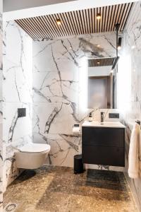 Koupelna v ubytování Lundur Apartments - Down Town