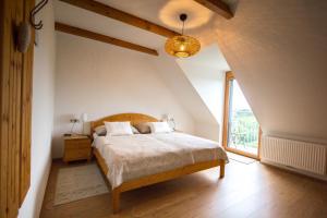 A bed or beds in a room at Gästehaus Dworschak
