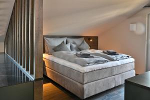 a bedroom with a large bed in a room at BergChalet in Garmisch-Partenkirchen