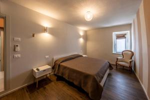 Postel nebo postele na pokoji v ubytování Dimora Montagnoli