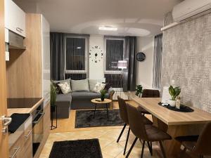 Posedenie v ubytovaní Európa 20 Apartman