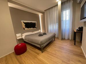 Postel nebo postele na pokoji v ubytování LUCRINO 45 by Ale