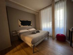 Postel nebo postele na pokoji v ubytování LUCRINO 45 by Ale