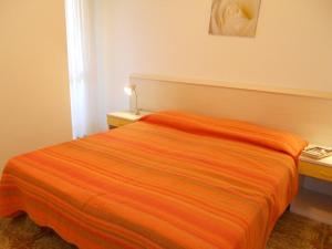 A bed or beds in a room at Modern flat with terrace - Beahost Rentals
