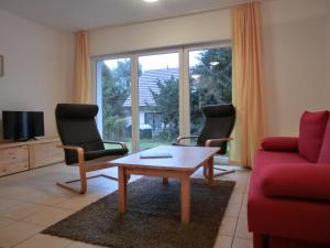 Χώρος καθιστικού στο Ferienwohnung NH13
