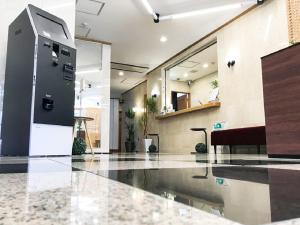ครัวหรือมุมครัวของ HOTEL LiVEMAX BUDGET Fuji Ekimae