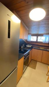 A kitchen or kitchenette at Attico Vista Tofane