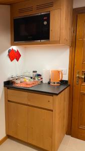 A kitchen or kitchenette at Attico Vista Tofane
