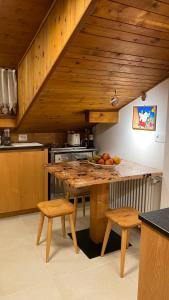 A kitchen or kitchenette at Attico Vista Tofane