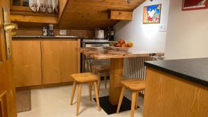 A kitchen or kitchenette at Attico Vista Tofane