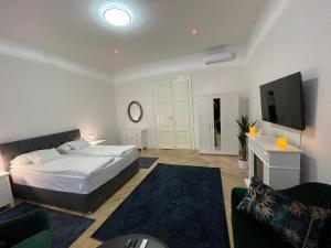 Postel nebo postele na pokoji v ubytování Fullmoon Luxury Apartment