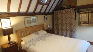 Voodi või voodid majutusasutuse 17th Century 2-Bed Sleeps 4 Free Parking toas