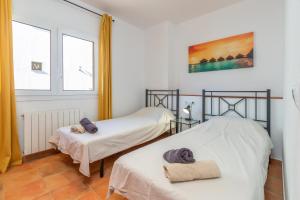 Postel nebo postele na pokoji v ubytování Villa la Roca + 22 fotografií