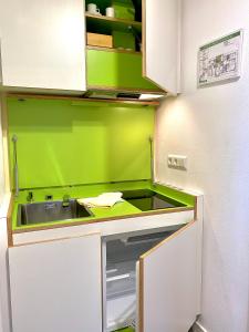 Kuchyň nebo kuchyňský kout v ubytování Sonnhof Apartments Tegernsee - zentral und perfekt für Urlaub & Arbeit