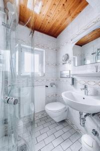 Koupelna v ubytování Weidegg - Hotel Garni