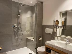 Koupelna v ubytování Sonnhof Apartments Tegernsee - zentral und perfekt für Urlaub & Arbeit + 37 fotografií
