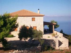 VolímaiにあるVilla Anastasiaの海の見える石造りの家