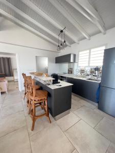 Köök või kööginurk majutusasutuses Villa Amaryllis luxueuse,piscine,vue mer,plage