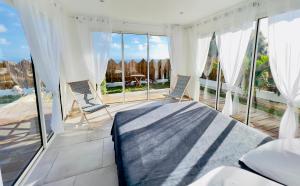 Rõdu või terrass majutusasutuses Villa Amaryllis luxueuse,piscine,vue mer,plage