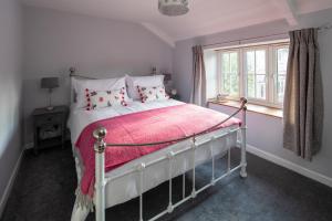 Katil atau katil-katil dalam bilik di Woodcutter's Cottage