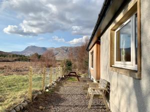 Nespecifikovaný výhled na hory nebo výhled na hory při pohledu z prázdninového domu