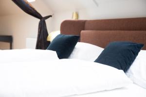 Voodi või voodid majutusasutuse Blackhome Wien I contactless check-in toas